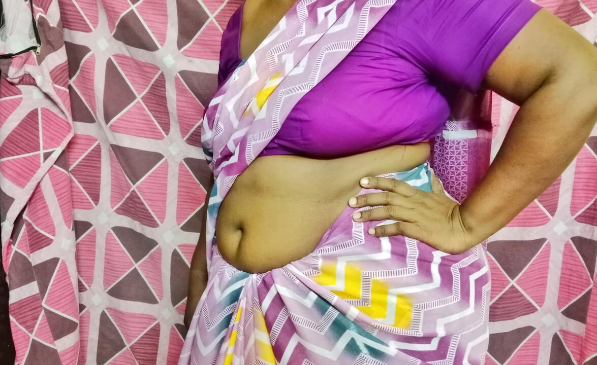 A beautiful Tamil wife, tying a sexy saree, arouses lust and leaves for work.